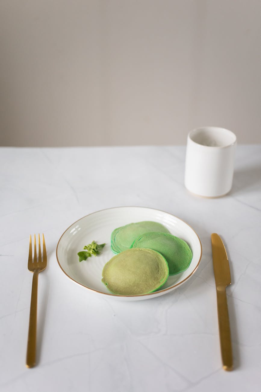 green circles and dishware on table do carbs make you fat